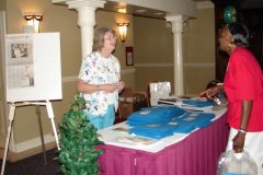 Registration Table with Mary Smith