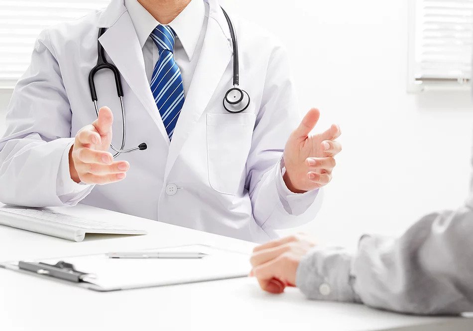 Photo cutout of a doctor explaining something to their patient